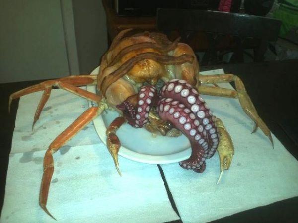 Octopus stuffed inside a turkey and garnished with crab legs and bacon