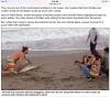 Man pulls shark from water for a picture