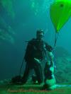 Kurt Huber on platform with new Blue Grotto Mascot