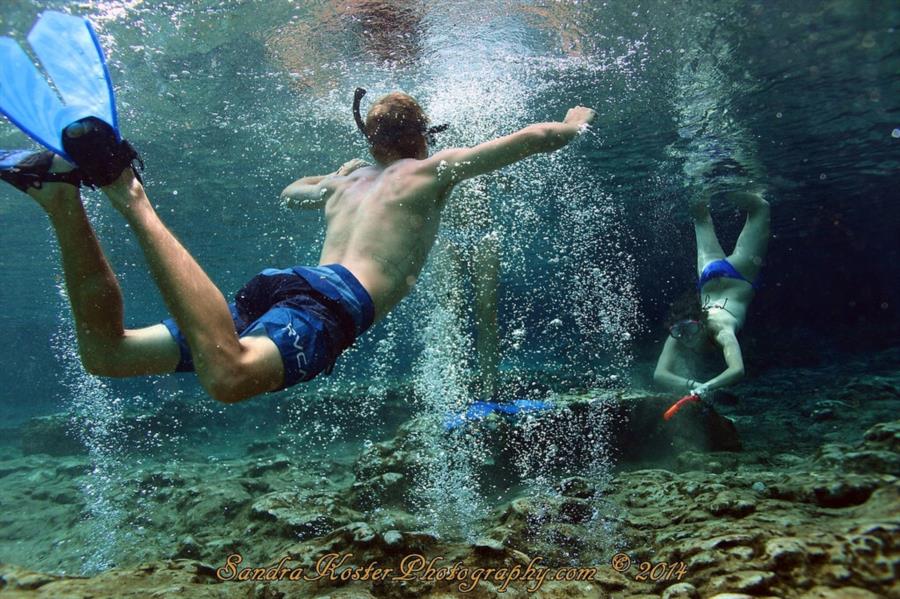 Kids having fun playing in the basin at Ginnie Springs