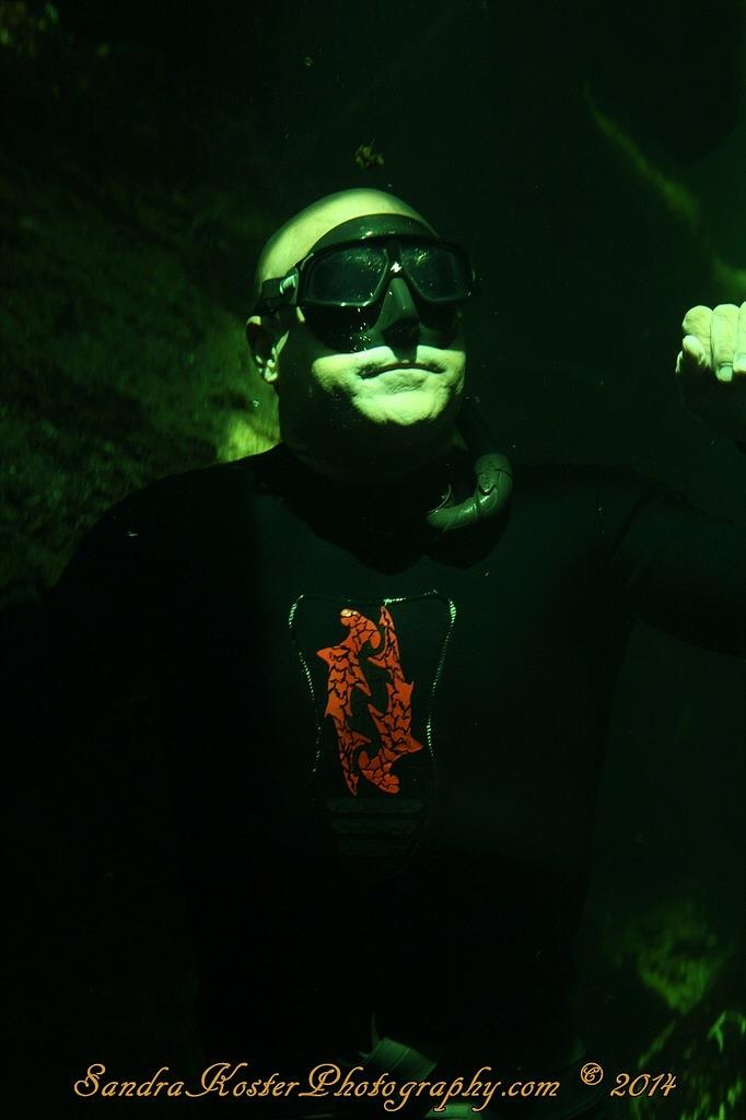 Freediver David Head looking like a SuperHero inside Blue Spring State Park spring