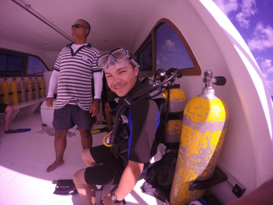 My son getting ready for his first dive