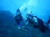 fellow divers blowing bubbles