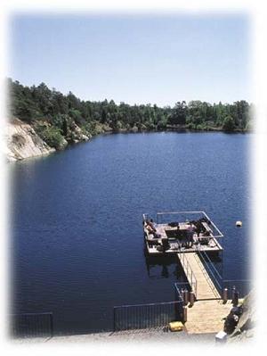 Blue Stone Dive Resort - Above water view of pier