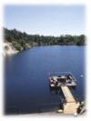 Blue Stone Dive Resort - Above water view of pier