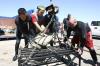 At the weigh-in with large concrete blocks recovered from river