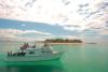 Beqa Lagoon Resort - Boat on crystal clear water