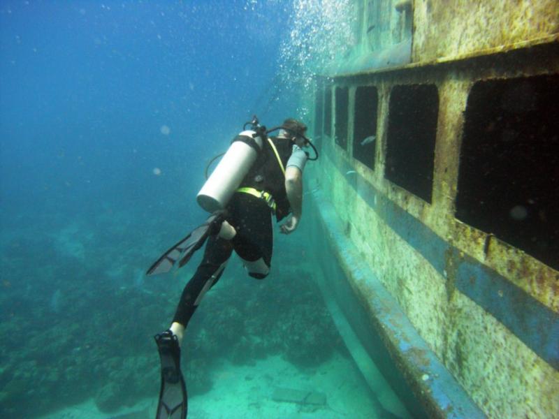 Atlantic Princess Wreck - Diver on the Side of the Atlantic Princess