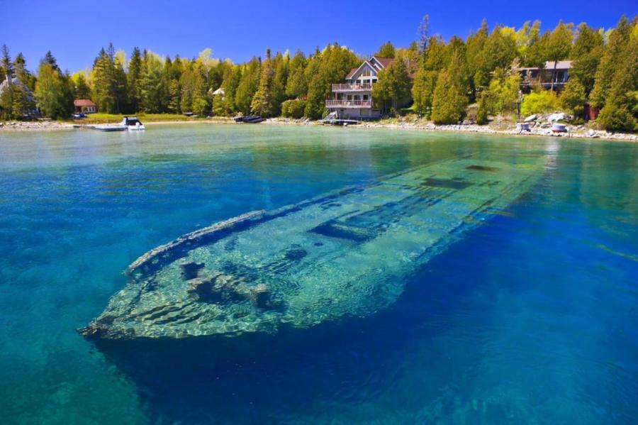 Sweepstakes - View of Sweepstakes shipwreck through clear water.