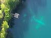 Aerial view of plane through clear water