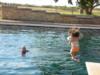 Macy and Greg at Balmorhea State Park, TX...jumping from diving board.