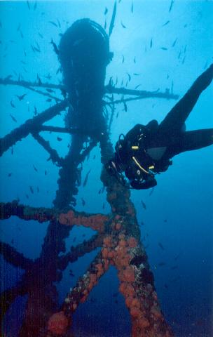 Diver alongide crows nest of CG Duane, FLa Keys