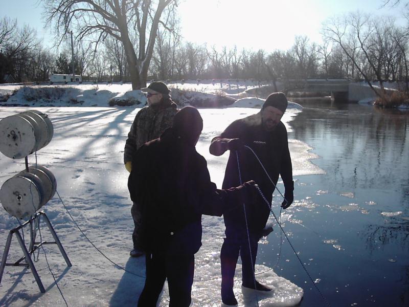ice diving out making the hole
