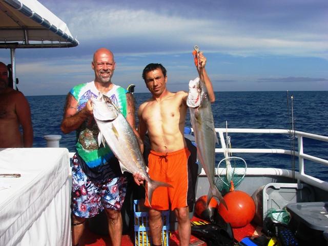 Chris with the money fish, Victor with his Daddy, both Amberjacks