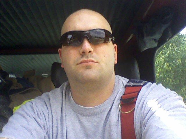 Just me on teh back of the fire truck going to a call.