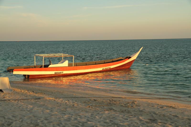 Long boat at the Mabul Resort