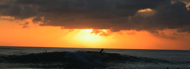 surfing sunset in BALI