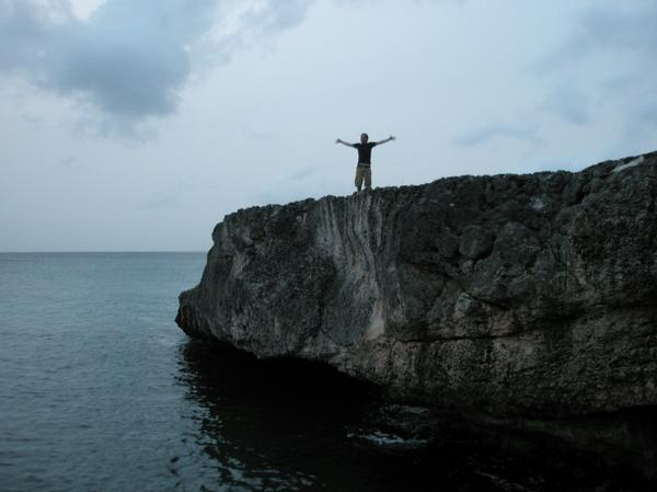 jumping off some cliffs in St. Marteen