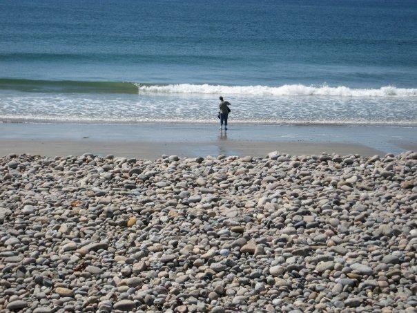 Buddy Brian wetting BC strap at Pebble Beach