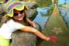 Harlie holding a starfish at Seaworld