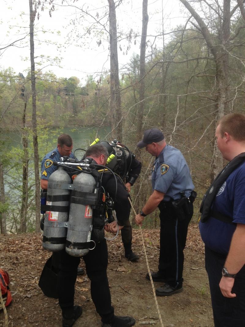 Rappelling to dive site for recovery