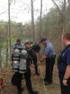 Rappelling to dive site for recovery