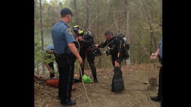 Rappelling to dive site for recovery