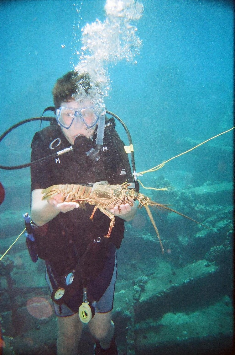 Keenan - with a lobster we found at Mala Ramp