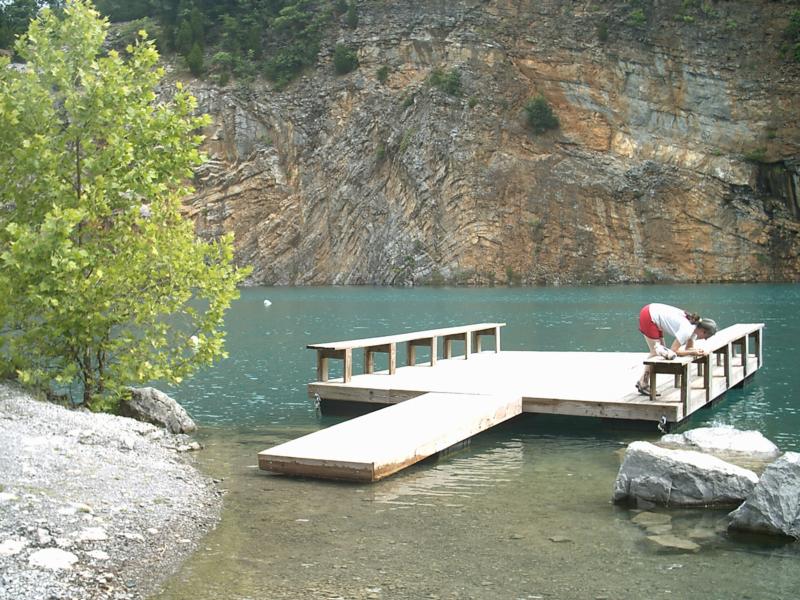 Monica feeds the fish at Philadelphia (Tennessee) Quarry