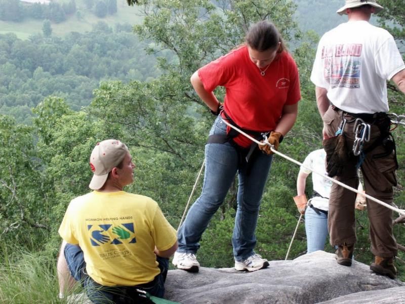 Me (yellow) teaching rappelling, 2010