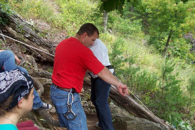 Richard (red) teaching rappelling, 2008