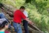 Richard (red) teaching rappelling, 2008