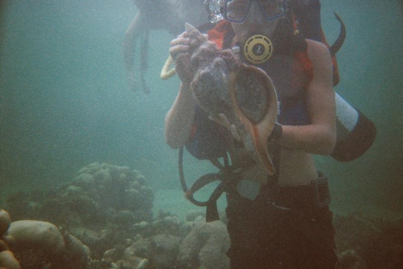 My son with a Conch