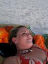 laying on the beach on Anna Maria Island, FL