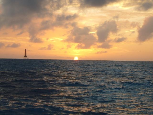 Sunset over Sombrero Reef and lighthouse tower, Keys