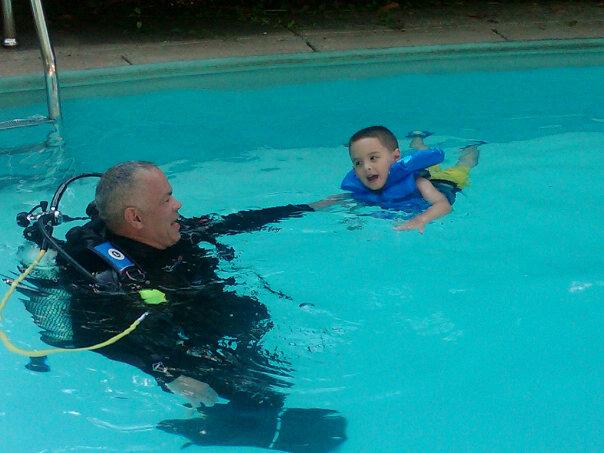 granpaw and Nico in the pool