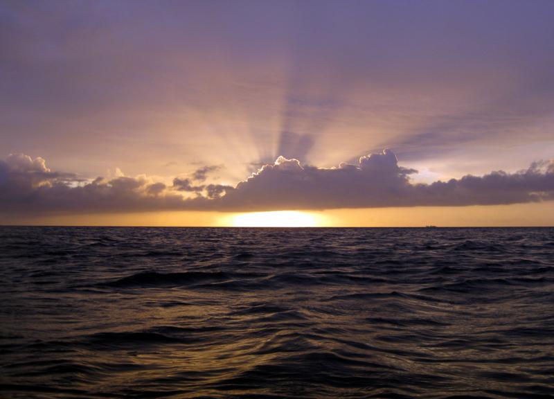 Entering the water, watching the Okinawan sunset.