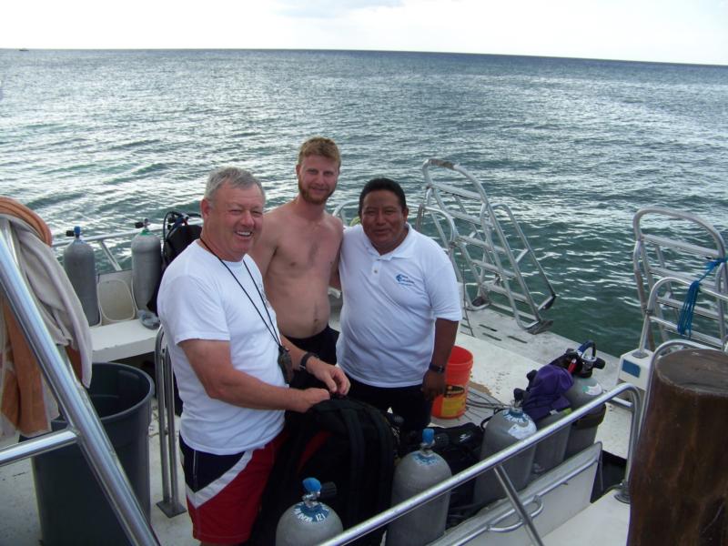 my dad, boat captain, and i 