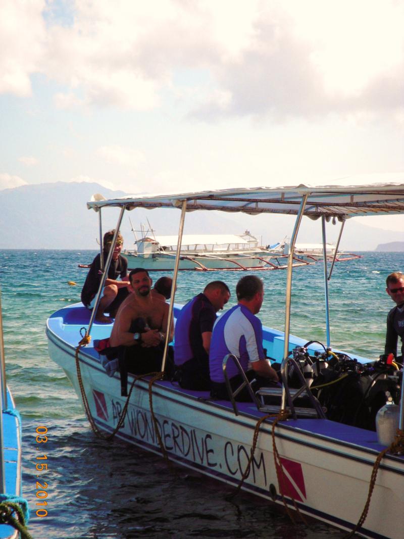 gearing up for a drift dive off the Verde Island wall