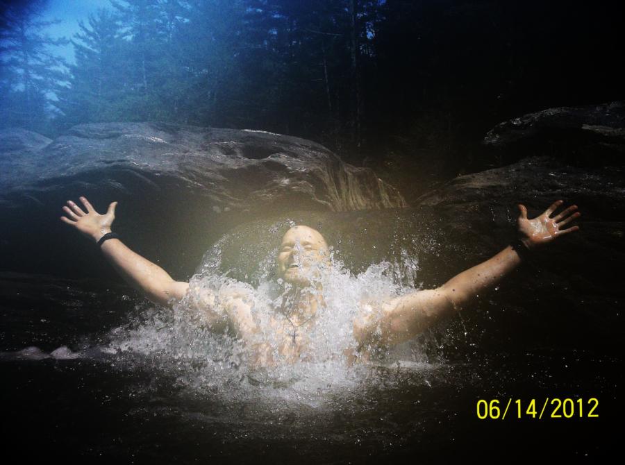 Me under a small waterfall