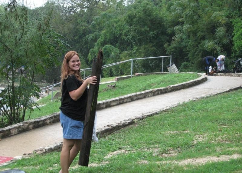 Becky carrying a log during TrashFest 2009