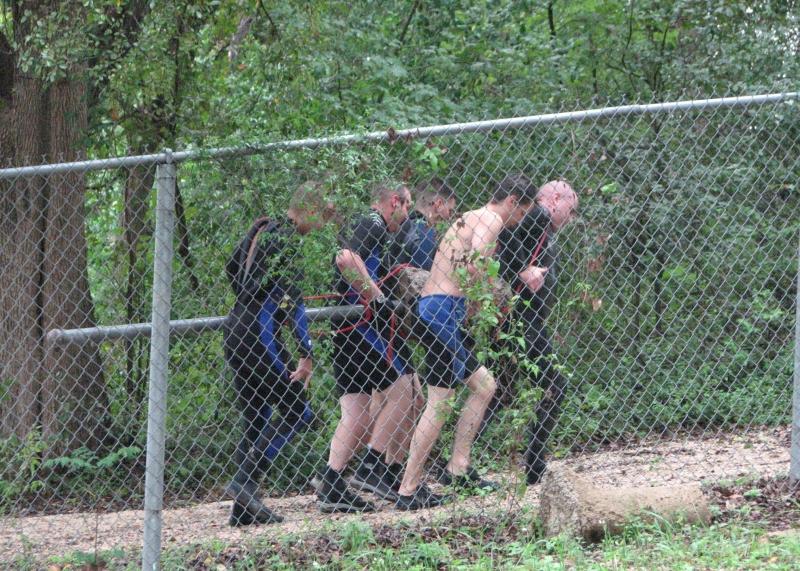 Carrying the pole to the weight station during TrashFest 2009