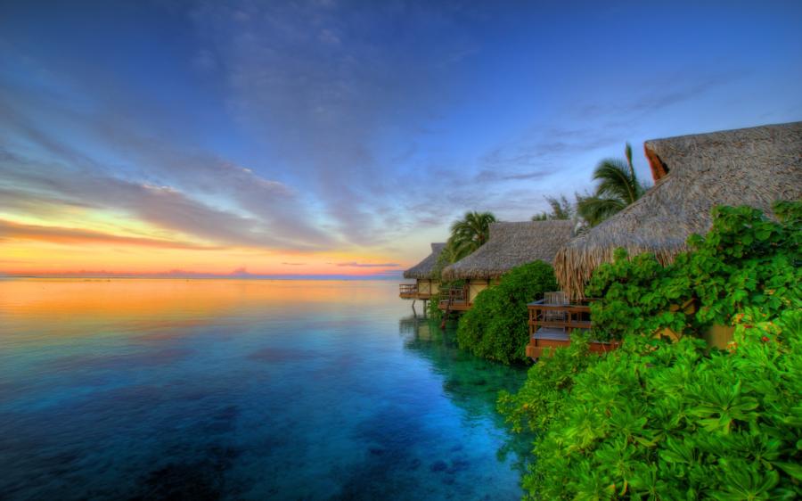 Sunset over water in Moorea, French Polynesia