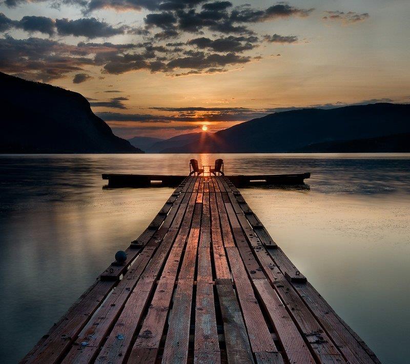Pier over water, sunset