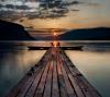 Pier over water, sunset