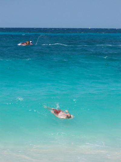 Me floating in the ocean in Nassau, Bahamas.