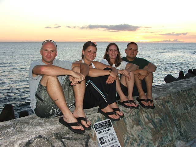 Good friends, getting ready for a night dive in Okinawa Japan