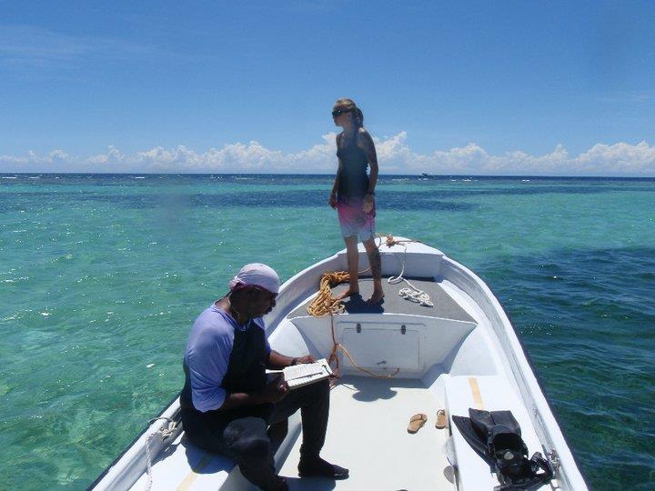 Scuba instructor candidate checks area for safety...Divepath.com