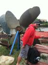 Istructor striking a pose in front of the Prins Willem propeller