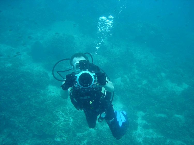 Yours truly with my video camera and underwater housing